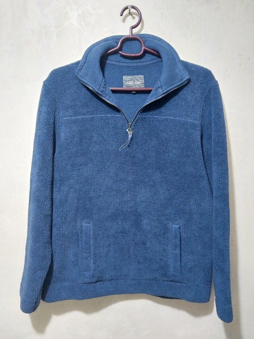 M&S Man Blue Quarter Zip Fleece Pullover Size M (Category: Coats, Jackets and Outerwear) located in Manila. Submitted by PrinceDani.Clothing (Listing ID 1468337420, Image 2). Description: - Brand: M&S Man - Size: Medium - Color: Blue - Design: Quarter-zip neck with high collar - Features: Two front pockets, ribbed hem and cuffs - Material: Soft textured fleece - Condition: Clean and well-maintained Medium 22in width 26in length excellent conditio