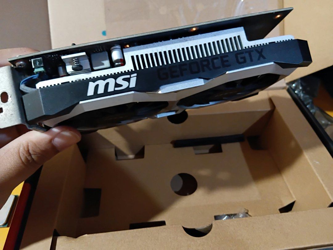 MSI Geforce GTx 1650 (GPU) (Category: Computer Parts) located in Marikina City. Submitted by lanej (Listing ID 1468385296, Image 2). Description: MSI graphics card with dual-fan cooling system. It features a black-and-silver design and a compact build. ✅ Ideal for a PC build or upgrade ₱3500 No flaw/issue RFS: upgrade.