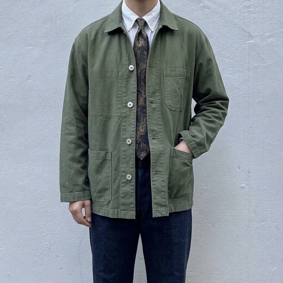MUJI Utility Workwear Chore Jacket (Category: Coats, Jackets and Outerwear) located in Puerto Princesa. Submitted by terdsthrift (Listing ID 1468423557, Image 2). Description: MUJI Utility Workwear Chore Jacket Width: 24 Length: 29 Shoulder: 21 In Good Condition / No Issue Color Rate: 9/10 - Color: Olive green - Size: Medium - Material: Heavy twill cotton - Pockets: Four front patch pockets, one single chest pocket - Closure: Metal buttons with a