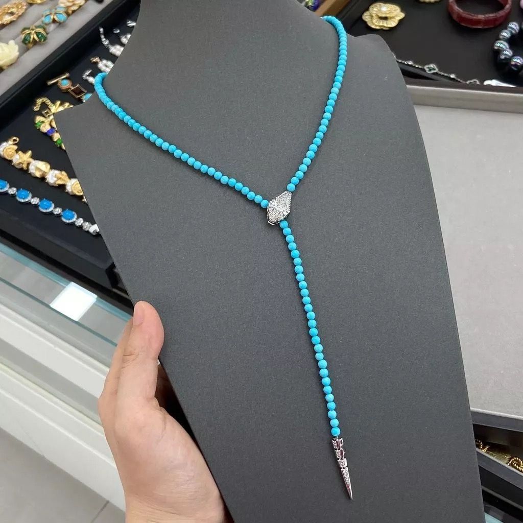 Natural Blue Turquoise Snake Serpenti Beaded Necklace (Category: Necklaces) located in Mandaluyong City. Submitted by allaboutgemsandco (Listing ID 1468294792, Image 3). Description: Natural Blue Turquoise Snake Serpenti Beaded Necklace Chain Size: 66cm Stone size: 4mmx4mm Price: Php 2,400 LOWEST PRICE OFFERED. Add shipping fee for orders less than P1000 Client gave permission to post her photos. Blurred out image of eyes to protect her identity.