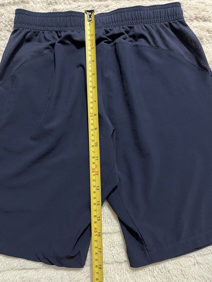 Navy Blue Athletic Shorts with Zipper Pockets (Category: Babies & Kids Fashion) located in Manila. Submitted by kiks_secret_room (Listing ID 1468381914, Image 3). Description: Features secure zippered pockets, a comfortable elastic waist, and side slits for easy movement..