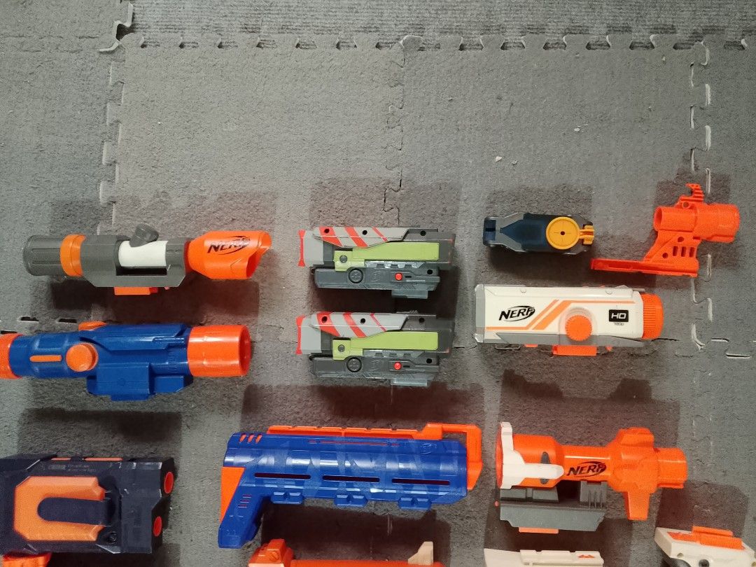 Nerf Blaster Attachments, Scopes, Drums, and Magazines (Category: Action & Battle Toys) located in Manila. Submitted by anvicnicajeff (Listing ID 1468331443, Image 2). Description: - Huge Nerf accessory bundle (N-Strike and Elite series) - Includes multiple scopes, tactical rails, and barrel attachments - Comes with drum magazines and standard clips - Everything shown in the pictures is included - Sold as a complete set only (no tingi/individual 