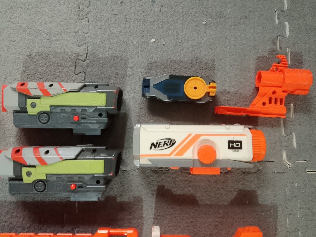 Nerf Blaster Attachments, Scopes, Drums, and Magazines (Category: Action & Battle Toys) located in Manila. Submitted by anvicnicajeff (Listing ID 1468331443, Image 3). Description: - Huge Nerf accessory bundle (N-Strike and Elite series) - Includes multiple scopes, tactical rails, and barrel attachments - Comes with drum magazines and standard clips - Everything shown in the pictures is included - Sold as a complete set only (no tingi/individual 