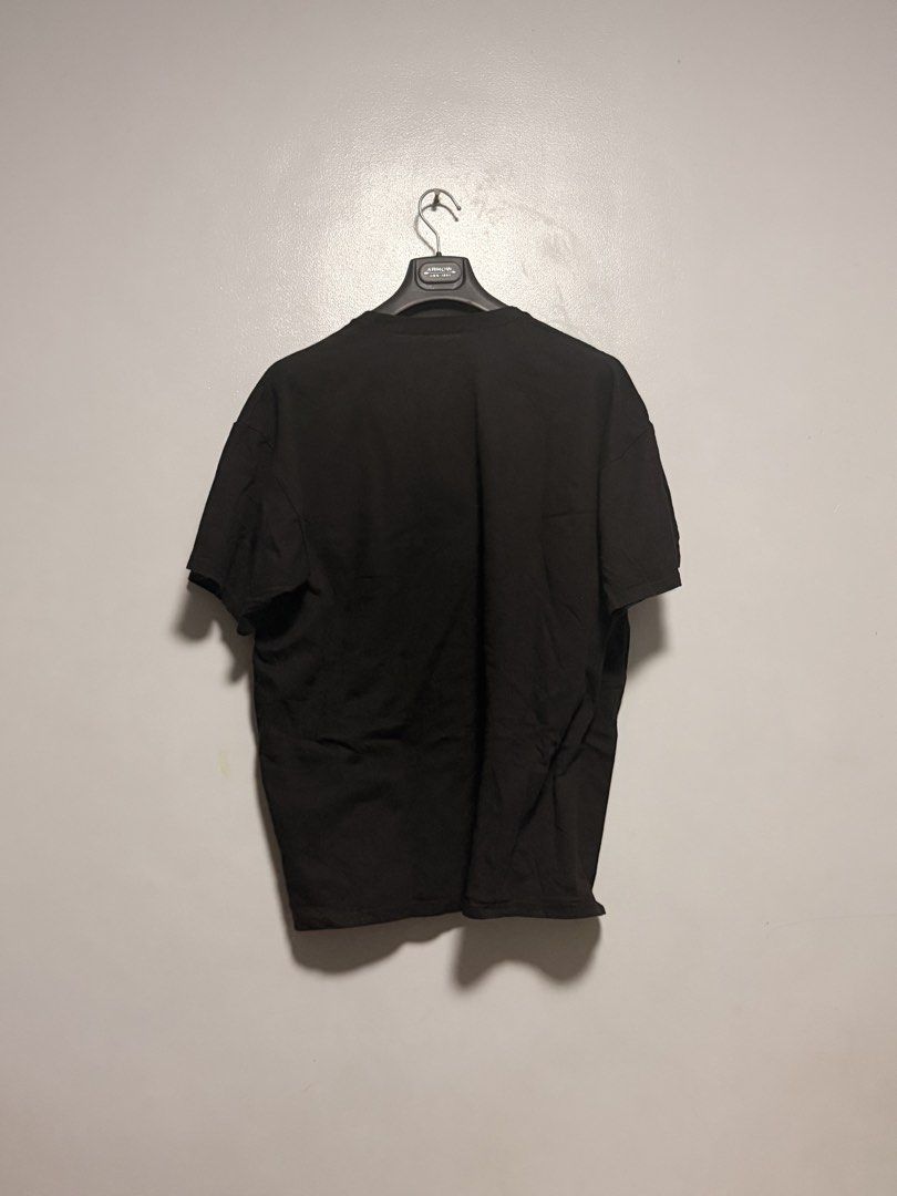 Nevada Wolf Pack Black T-Shirt XXL (Category: Tshirts & Polo Shirts ) located in Manila. Submitted by swiftgem.eeb06e (Listing ID 1468410393, Image 2). Description: - Brand: Champs Sports College Team Edition Apparel - Design: Black graphic tee with bold 'NEVADA' patterned fill and 'WOLF PACK' text - Size: XXL - Material: 100% cotton with a comfortable tagless collar - Origin: Made in Nicaragua - Condition: Excellent, ready to wear - Dimes: 24x27