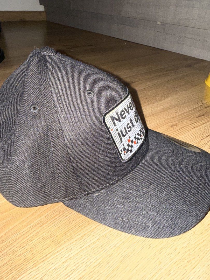 NEVER JUST DRIVE SNAPBACK CAP – BLACK (Category: Caps & Hats) located in Las Pinas. Submitted by coolthreadz (Listing ID 1468401527, Image 2). Description: 🧢 NEVER JUST DRIVE SNAPBACK CAP – BLACK 🏷️ Brand: Yupoong Classics 🧢 Model: Classic Snapback Cap 🎨 Color: Black / White 📏 Size: One Size Fits Most (Adjustable) 🧵 Material: 80% Acrylic, 20% Wool 🔖 Design: “Never Just Drive” Racing-Inspired Patch ✨ Condition: Good / Preloved * Black snapb