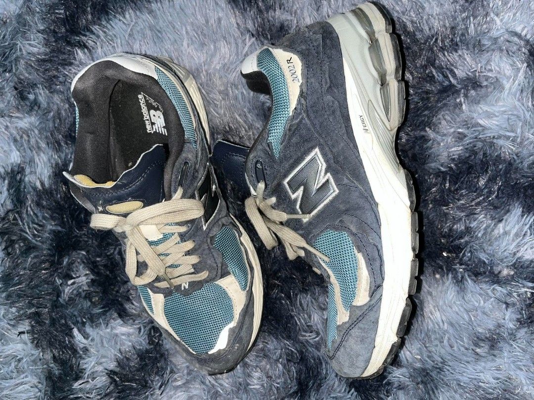 New Balance 2002R Navy Teal Protection Pack (Category: Sneakers) located in Manila. Submitted by thrift_ni_pambiii (Listing ID 1468342833, Image 3). Description: - Model: New Balance 2002R - Colorway: Navy and Teal - Materials: Raw edge suede overlays with breathable mesh underlays - Comfort: ABZORB midsole cushioning for all-day wear - Details: Classic side N logo, beige laces, and vintage-style yellowed collar lining and heel tab - Condition: W