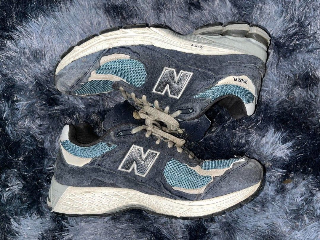 New Balance 2002R Navy Teal Protection Pack (Category: Sneakers) located in Manila. Submitted by thrift_ni_pambiii (Listing ID 1468342833, Image 1). Description: - Model: New Balance 2002R - Colorway: Navy and Teal - Materials: Raw edge suede overlays with breathable mesh underlays - Comfort: ABZORB midsole cushioning for all-day wear - Details: Classic side N logo, beige laces, and vintage-style yellowed collar lining and heel tab - Condition: W