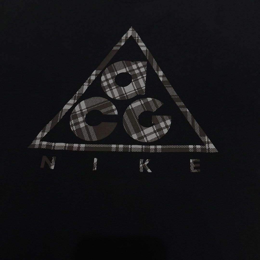 Nike ACG (Category: Tshirts & Polo Shirts ) located in Manila. Submitted by craffee00 (Listing ID 1468334773, Image 3). Description: 🔥 Nike ACG Plaid Triangle Logo Dri Fit (Size M-L) 🔥 • Brand: Nike ACG • Size on Tag: 170/88A (Fits like a Regular Medium / Slim Large) • Dimes: 20x29 📐 • Material: 65% Cotton / 35% Polyester (Super soft blend!) • Condition: 9/10 — Very clean, crisp graphic, no fading or holes. ‼️‼️‼️DM to lock it in! (Offer na di