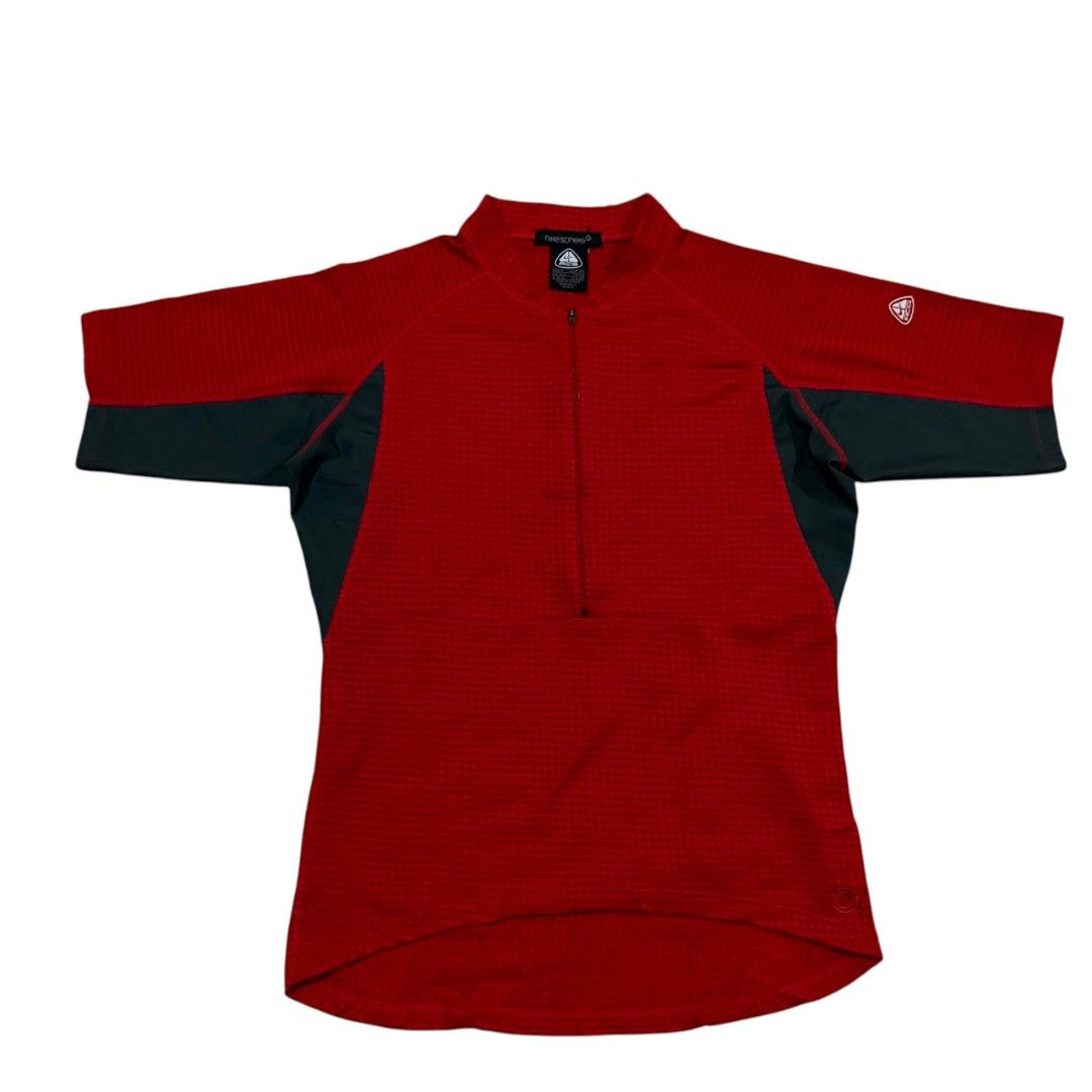 Nike ACG Red Black Half-Zip Short Sleeve (Category: Activewear) located in Cagayan de Oro. Submitted by lootfindzzzz (Listing ID 1468355528, Image 1). Description: - Authentic Nike ACG short sleeve cycling jersey - Color: Red and dark grey with solid contrast side panels - Half-zip front closure with mock neck collar - Breathable grid-textured fabric construction - Drop-tail back hem designed for cycling posture - Iconic ACG triangle logo printed