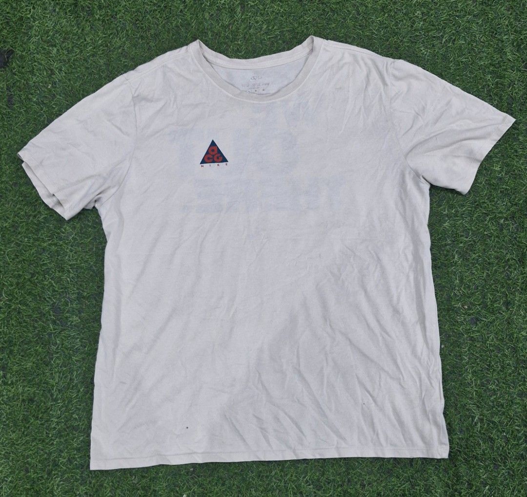 Nike acg Tee (Category: Tshirts & Polo Shirts ) located in Pili. Submitted by the_g_thrift (Listing ID 1468407323, Image 1). Description: size xl dimes: 24 x 29 excellent condition cream or dirty white color way nya.