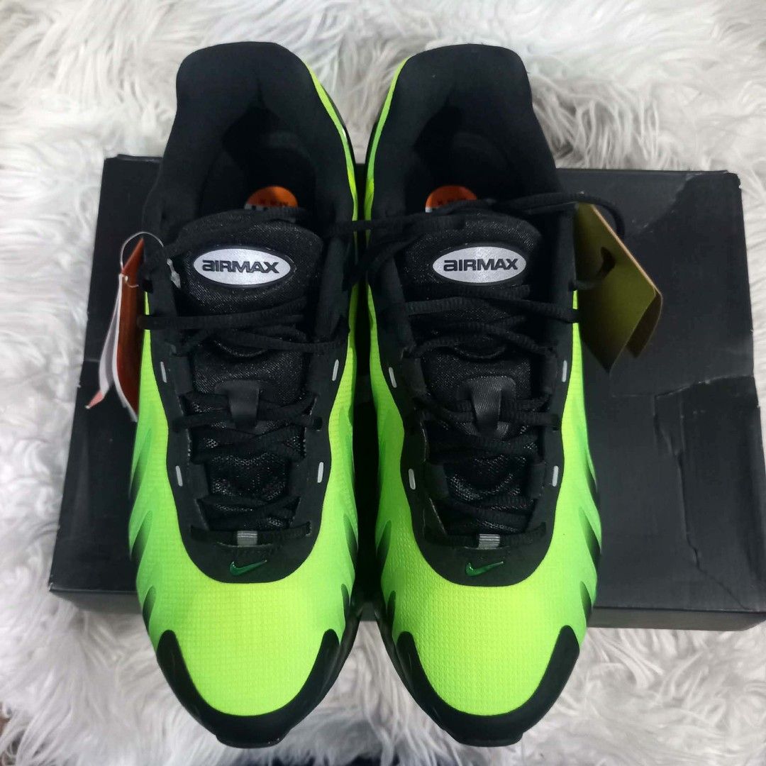 Nike Air Max Dn Neon Green Black (Category: Sneakers) located in Cavite. Submitted by tobias_7795 (Listing ID 1468442735, Image 3). Description: - Model: Nike Air Max Dn - Colorway: Neon Green and Black (Gradient Upper) - Condition: Brand new with tags (DS), unworn - Features: Signature air cushioning pods along the midsole - Inclusions: Original Air Max shoebox and black laces included - Authenticity guaranteed, message for fast shipping or meet