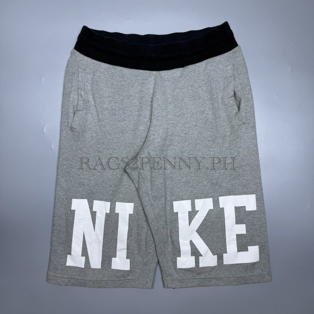 Nike Air Reversible Shorts (Category: Shorts) located in Kabacan. Submitted by rags2penny.phl (Listing ID 1468330895, Image 1). Description: - Brand: Nike Air - Style: Mesh shorts (Style Code: 646275-010, SP15) - Size: L - Color: Black and grey - Features: Elastic waistband with adjustable drawstrings, small Nike Air logo near hem - Material: Breathable mesh fabric - Condition: Great for workouts or casual wear Waistline : 30-36 Length : 25.
