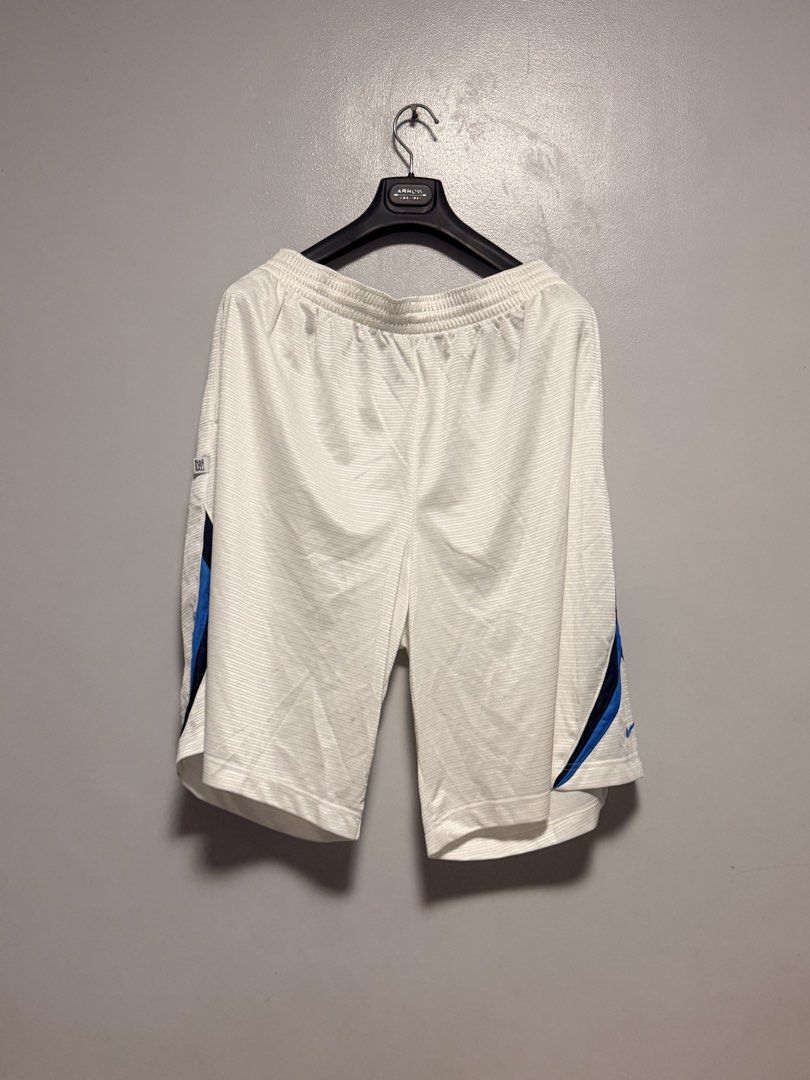 Nike Basketball Shorts White Blue (Category: Shorts) located in Manila. Submitted by swiftgem.eeb06e (Listing ID 1468390237, Image 1). Description: - Authentic Nike white basketball shorts - Stylish blue and black side stripes - Comfortable elastic waistband with all-over textured pattern - Small branded tag near the right pocket - Lightweight and breathable material - Ideal for gym workouts, pickup games, or lounging - Dimes: 17.5x24in - Conditi