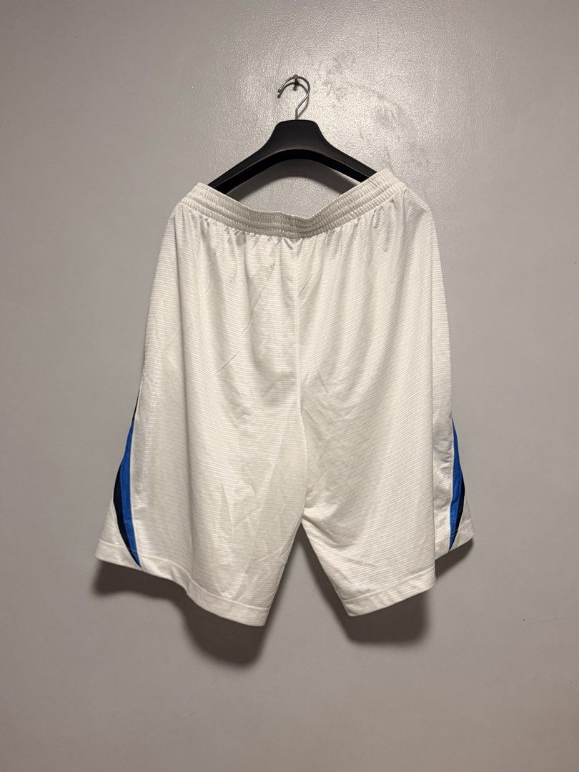 Nike Basketball Shorts White Blue (Category: Shorts) located in Manila. Submitted by swiftgem.eeb06e (Listing ID 1468390237, Image 2). Description: - Authentic Nike white basketball shorts - Stylish blue and black side stripes - Comfortable elastic waistband with all-over textured pattern - Small branded tag near the right pocket - Lightweight and breathable material - Ideal for gym workouts, pickup games, or lounging - Dimes: 17.5x24in - Conditi