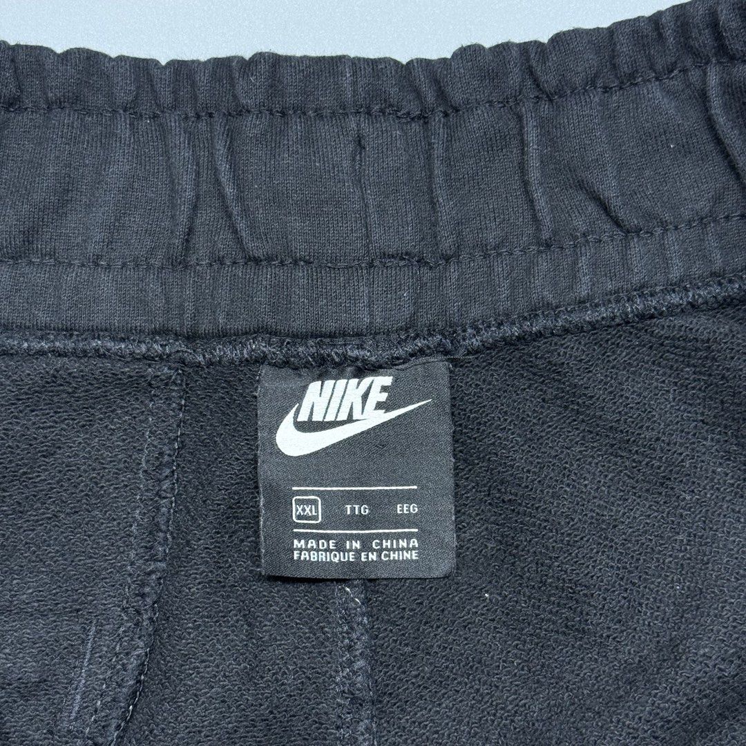 Nike Big Swoosh (Category: Shorts) located in Kabacan. Submitted by rags2penny.phl (Listing ID 1468331378, Image 3). Description: - Brand: Nike - Style: Giant Swoosh Fleece Shorts - Color: Black and White - Size: XXL - Style Code: AR3162-010 - Material: Warm and comfortable cotton blend - Features: Giant front swoosh graphic, small embroidered swoosh on leg, and elastic waistband with adjustable drawstrings - Perfect for daily wear, workouts, or 