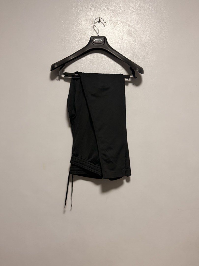 Nike Black Athletic Pants (Category: Joggers) located in Manila. Submitted by swiftgem.eeb06e (Listing ID 1468390235, Image 2). Description: - Brand: Nike - Color: Classic Black with White Swoosh logo - Material: Smooth, lightweight athletic fabric - Features: Drawstring waist for an adjustable fit, ribbed cuffs at the bottom hems - Condition: Clean, excellent, and ready to wear - Versatility: Ideal for gym workouts, running, or casual lounging -