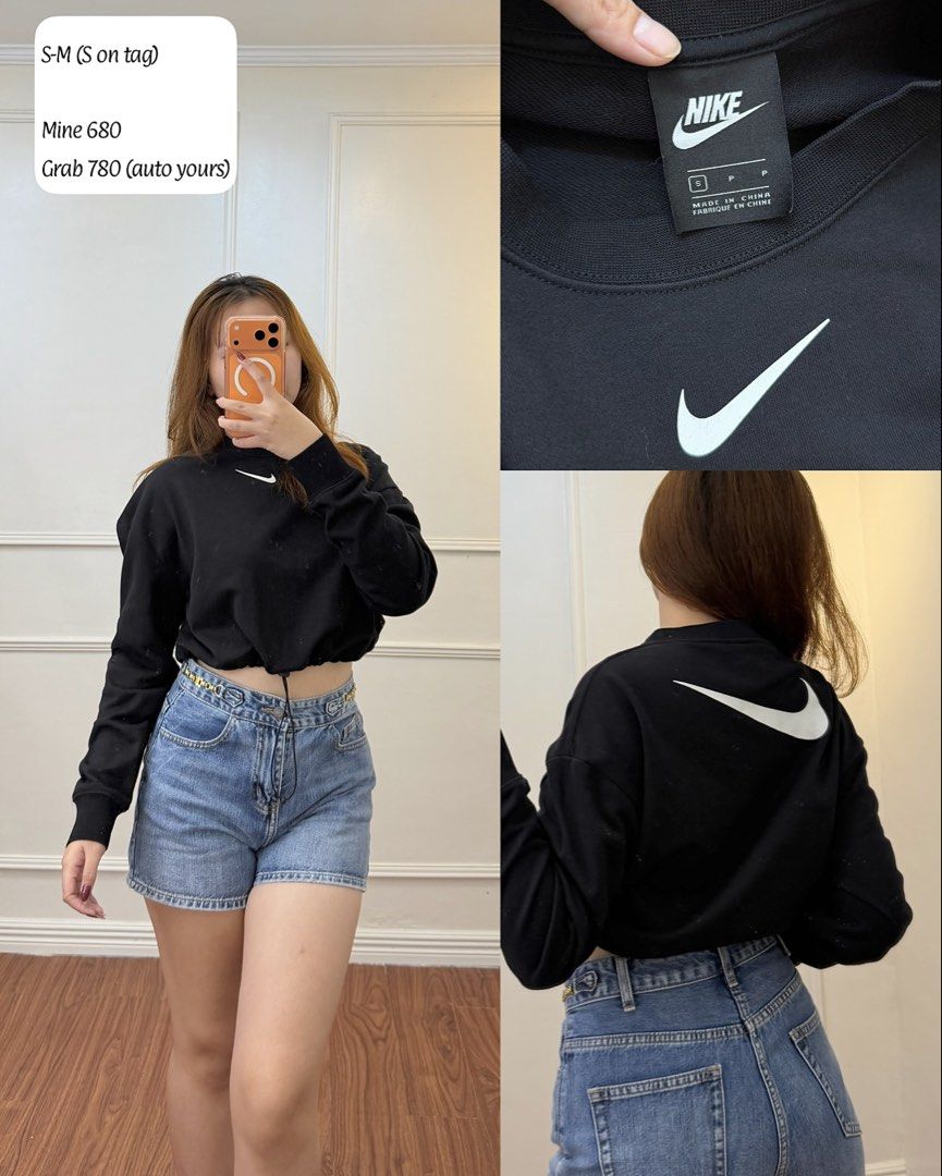 Nike Black Crop Sweatshirt Size S (Category: Coats, Jackets and Outerwear) located in Manila. Submitted by angelll0123 (Listing ID 1468448359, Image 1). Description: - Brand: Nike - Style: Crop sweatshirt with adjustable drawstring hem - Color: Black with white Swoosh logos on front and back - Size: Fits S to M - Condition: Brand new with tag intact - Material: Soft and comfortable for daily wear or casual outings.