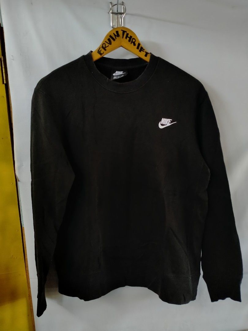Nike Black Sweatshirt BV2667-010 Size M (Category: Coats, Jackets and Outerwear) located in Davao. Submitted by ervinpolino09 (Listing ID 1468289077, Image 1). Description: - Brand: Nike - Item: Black crewneck sweatshirt - Size: Medium (Standard fit) - Style Code: BV2667-010 - Material: 80% cotton, 20% polyester blend - Design: Classic white embroidered swoosh logo on chest with ribbed collar, cuffs, and hem - Condition: Clean piece, perfect for 