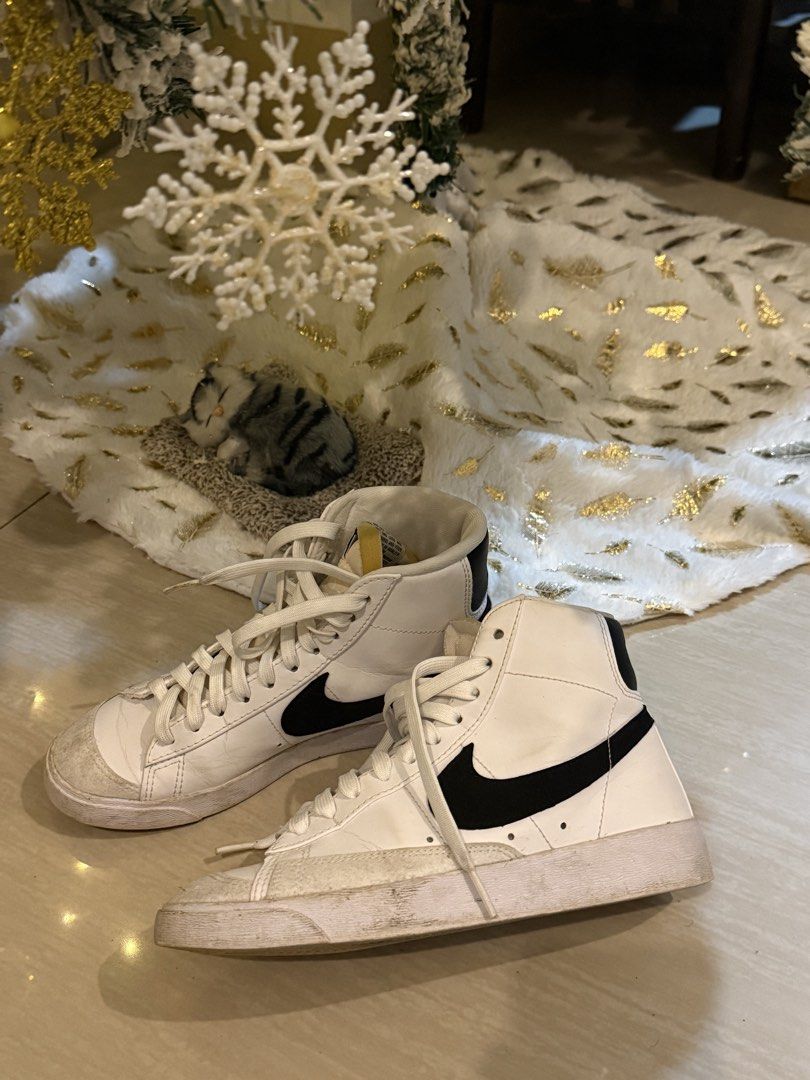 Nike Blazer Mid '77 Vintage White Black (Category: Sneakers) located in Manila. Submitted by hearty.y (Listing ID 1468411905, Image 3). Description: - Brand/Model: Nike Blazer Mid '77 Vintage - Colorway: White leather upper with iconic black swoosh - Details: Suede overlays at the toe, exposed foam tongue with vintage branding, and vibrant lime green insoles - Fit: Classic high-top profile with standard lace-up closure - Condition: Pre-owned with