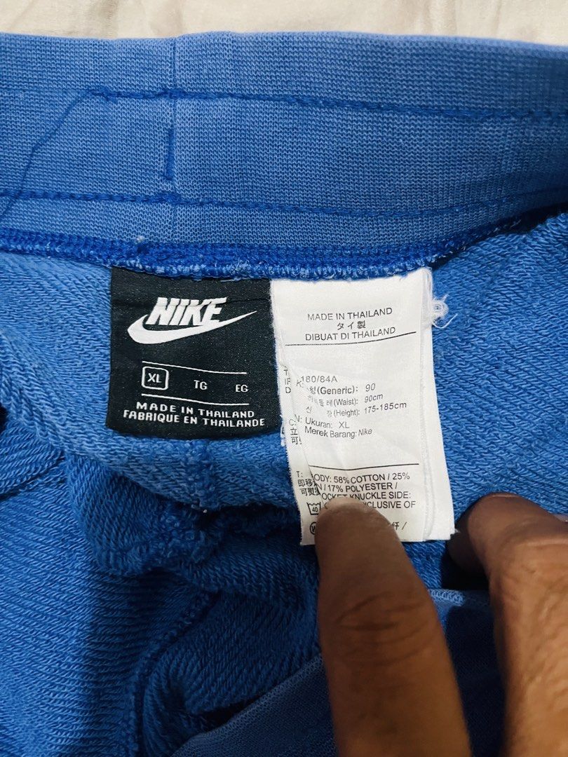 Nike Blue Men's Shorts Size XL (Category: Shorts) located in Manila. Submitted by athan0800 (Listing ID 1468284628, Image 3). Description: - Brand/Model: Nike Shorts - Color: Bright Blue with large white logo - Size: XL - Material: Cotton and polyester blend - Features: Elastic waistband, white drawstring, side pockets - Origin: Made in Thailand.