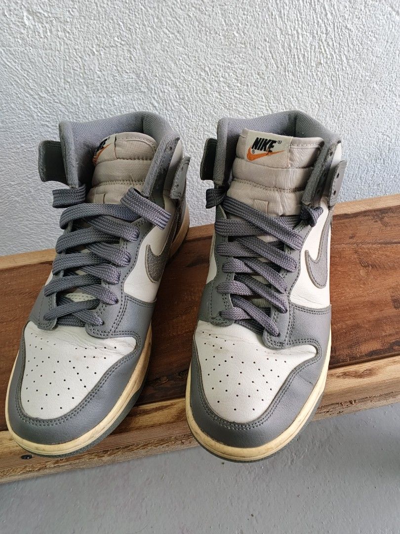 Nike Dunk High SE Lightbone (Category: Sneakers) located in Caloocan City. Submitted by edge_sports_apparel (Listing ID 1468296021, Image 2). Description: Nike Dunk High SE Lightbone. US 8. Eur 41 See condition on the pictures,some heel drag and minimal flaws.insole pads replaced with high cushion padding. Pls check tag to confirm legitimacy.