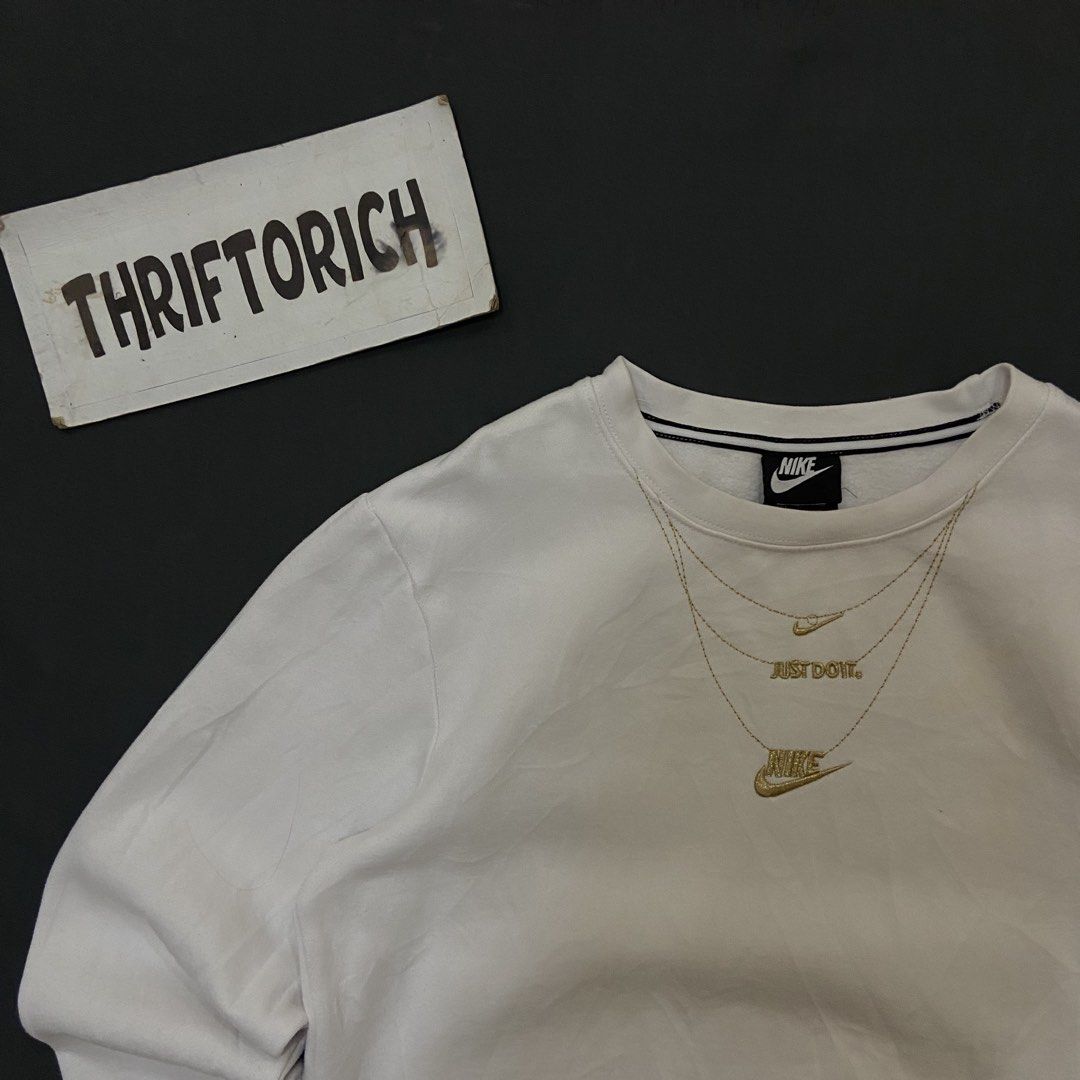 NIKE GOLD NECK LACE WHITE SWEATSHIRT (Category: Hoodies) located in Manila. Submitted by ivan_carbungco (Listing ID 1468454643, Image 2). Description: NIKE GOLD NECKLACE WHITE SWEAT SHIRT 20.5 by 24 GOOD CONDITION NEED WASH COMPLETE TAGS ₱1k CLAIM.