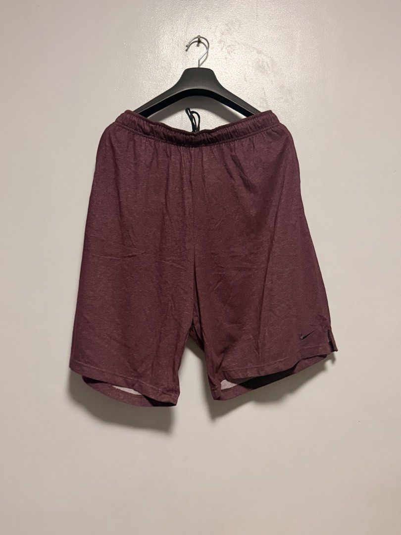 Nike Heather Maroon Athletic Shorts with Drawstring (Category: Shorts) located in Manila. Submitted by swiftgem.eeb06e (Listing ID 1468390855, Image 1). Description: - Authentic Nike athletic shorts in maroon - Elastic waistband with black drawstring for an adjustable fit - Small Nike swoosh logo near the lower left hem - Lightweight, breathable fabric ideal for gym workouts or lounging at home - Condition: Brand new / Excellent - Shipping via J&
