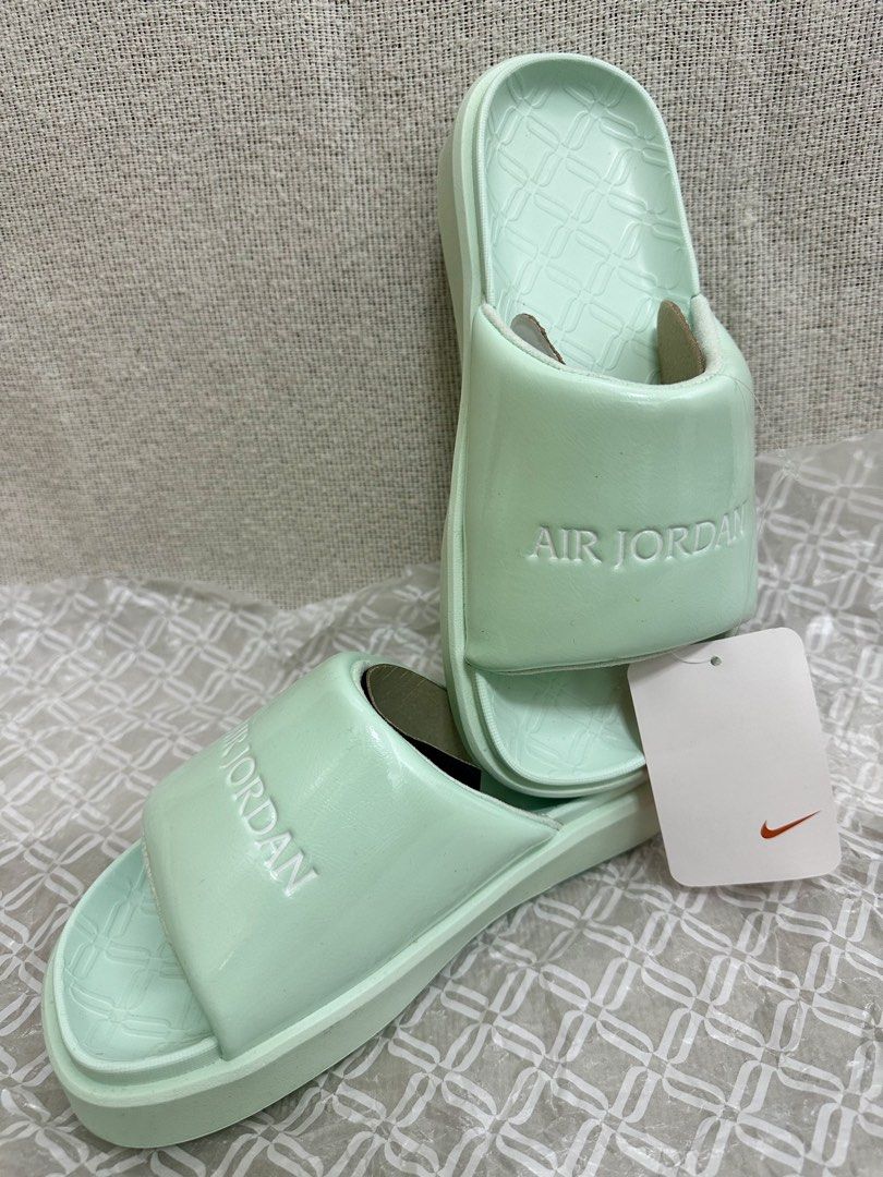 Nike Jordan Mint Green Slides Sandals (Category: Slippers and slides) located in Mandaluyong City. Submitted by kaycee_0821 (Listing ID 1468450465, Image 2). Description: Mint green Nike Jordan Sophia Women’s slides. Cushioned footbed with textured pattern. Embossed AIR JORDAN lettering across the strap. Brand new with original tags attached. Size US 6, UK 3.5, EUR 36.5. Lightweight and comfortable slip-on style. Style code: FZ7012-300 **box not 