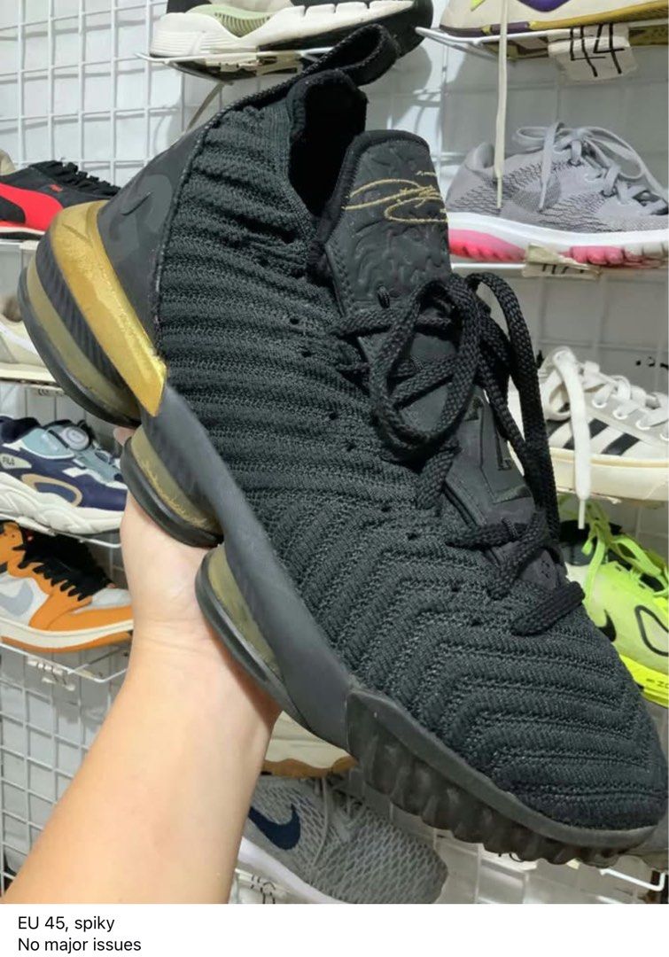 Nike LeBron 16 EP I'm King (Category: Sneakers) located in Caloocan City. Submitted by Twinsters_2nd (Listing ID 1468429438, Image 1). Description: - Brand: Nike LeBron 16 EP "I'm King" - Colorway: Sleek black knit upper with striking metallic gold heel accent - Size: EU 45 / US 11 - Outsole: Aggressive spiky traction pattern for maximum grip on court - Condition: Clean overall shape, well-maintained, and no major structural issues - Ideal for: B