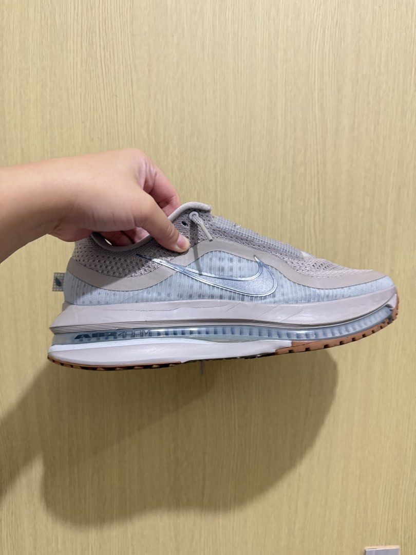 Nike Pegasus Premium Running Shoes (Category: Sneakers) located in Manila. Submitted by rosellegrey25 (Listing ID 1468452647, Image 3). Description: - Model: Nike Pegasus Premium running shoes - Colorway: Light grey and beige tones - Cushioning: Translucent side panels with visible Air Zoom unit - Upper: Textured mesh with reflective laces - Outsole: Gum rubber with great grip and traction - Details: Clean interior lining and branded insoles - St