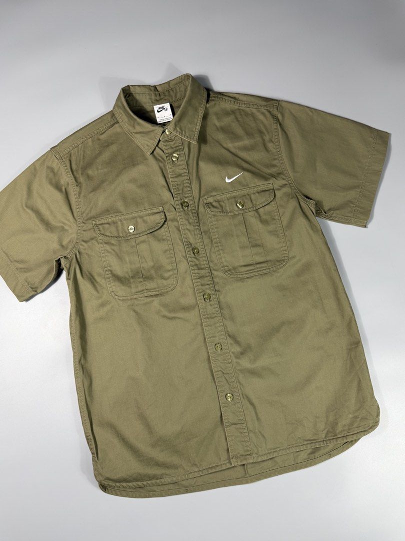 Nike SB Woven Pocket Button-Up S/S Polo (Category: Tshirts & Polo Shirts ) located in Manila. Submitted by whowearsstreetwear (Listing ID 1468458041, Image 3). Description: Nike SB Woven Pocket Button-Up S/S Polo (Authentic) - Size: Large fit (measurements in inches) W - 22 L - 30 Condition: Excellent - As New Flaw/s: none + shipping fee Location: Manila (Near UST).