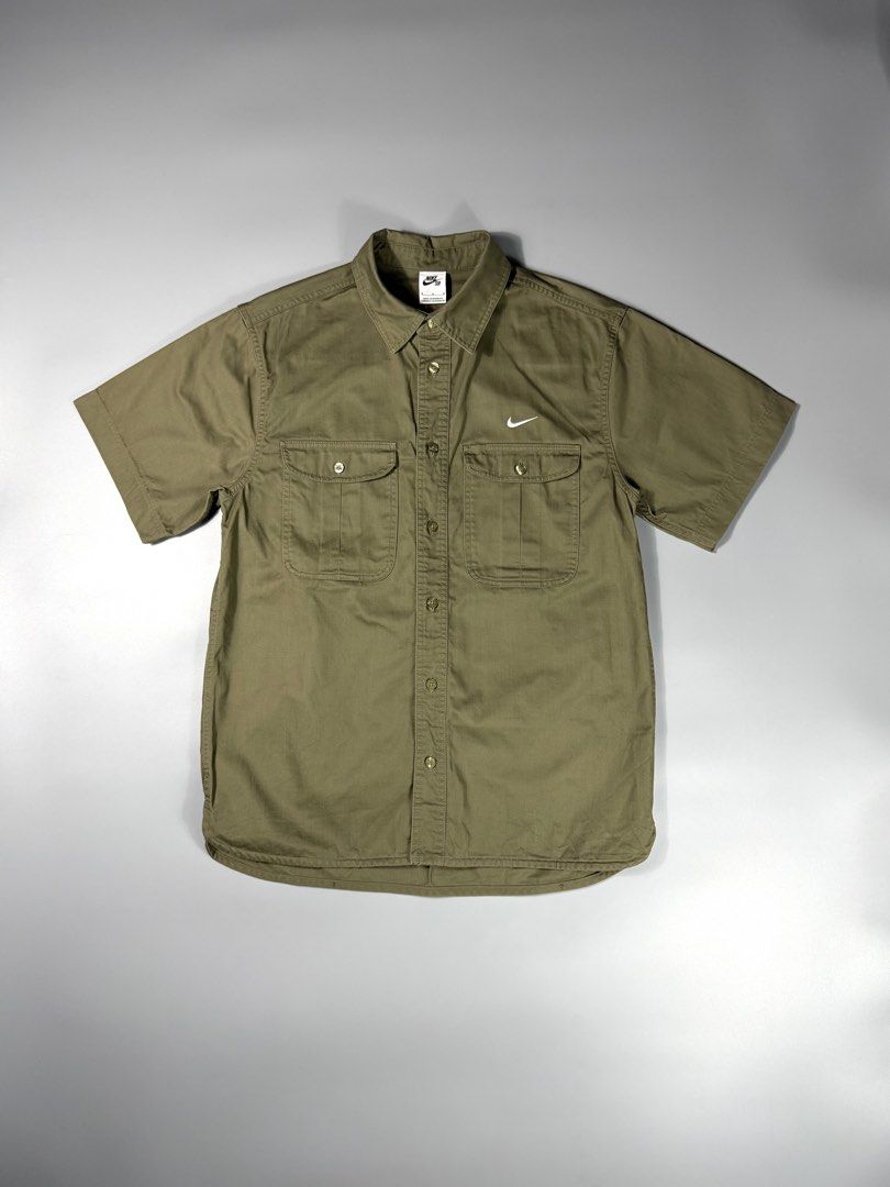 Nike SB Woven Pocket Button-Up S/S Polo (Category: Tshirts & Polo Shirts ) located in Manila. Submitted by whowearsstreetwear (Listing ID 1468458041, Image 1). Description: Nike SB Woven Pocket Button-Up S/S Polo (Authentic) - Size: Large fit (measurements in inches) W - 22 L - 30 Condition: Excellent - As New Flaw/s: none + shipping fee Location: Manila (Near UST).