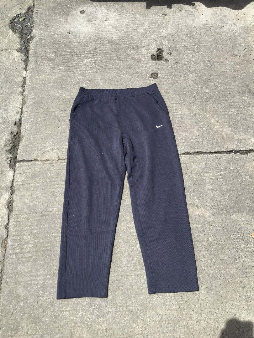 Nike sweatpants (Category: Chinos) located in Manila. Submitted by thriftnicarl.3 (Listing ID 1468450005, Image 2). Description: waist - 32 to 36 max length - 37.3 thigh - 12.2 leg open - 7.3 price - 449 free ship via jnt.