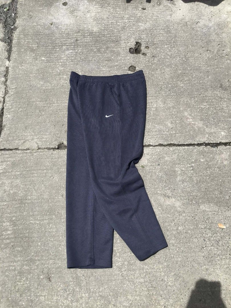 Nike sweatpants (Category: Chinos) located in Manila. Submitted by thriftnicarl.3 (Listing ID 1468450005, Image 1). Description: waist - 32 to 36 max length - 37.3 thigh - 12.2 leg open - 7.3 price - 449 free ship via jnt.