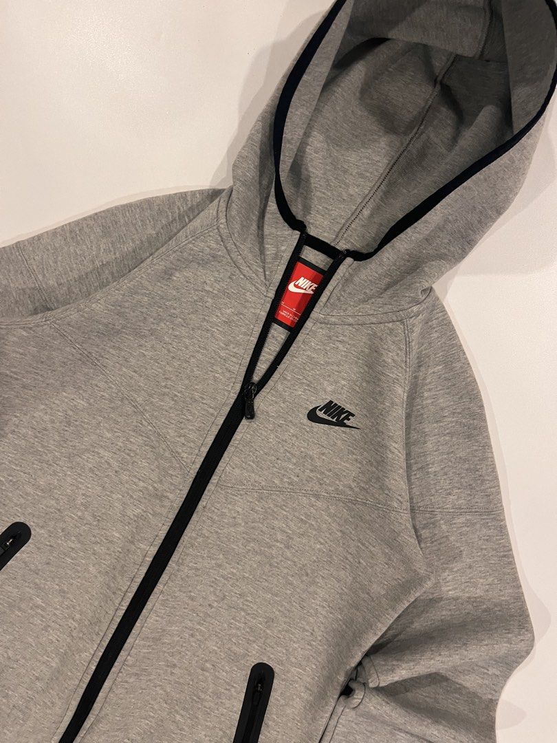 Nike techfleece in grey unisex (Category: Coats, Jackets and Outerwear) located in Iloilo. Submitted by joren_ian (Listing ID 1468307210, Image 2). Description: Size:medium Dimes (Length×Width):22.5x18 ₱500 Condition:like new Issue:semi bacon sleeves ribbings check pictures .