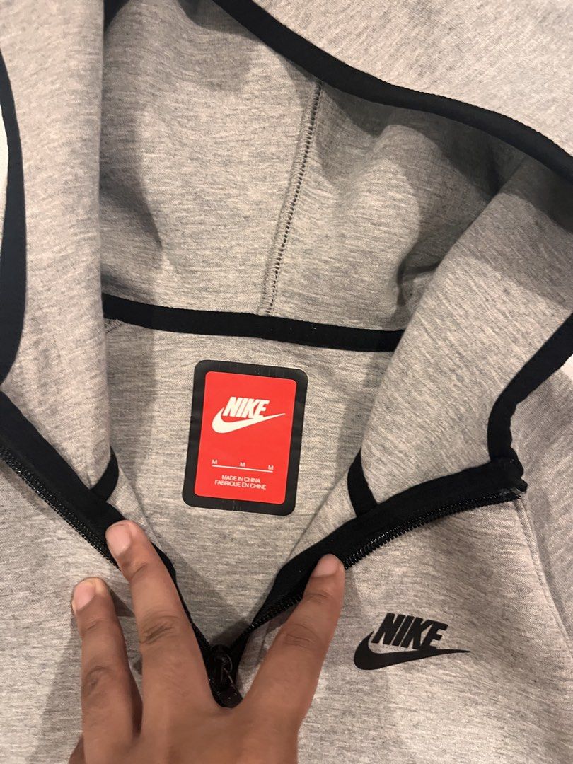 Nike techfleece in grey unisex (Category: Coats, Jackets and Outerwear) located in Iloilo. Submitted by joren_ian (Listing ID 1468307210, Image 3). Description: Size:medium Dimes (Length×Width):22.5x18 ₱500 Condition:like new Issue:semi bacon sleeves ribbings check pictures .