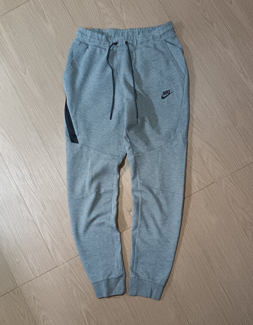NIKE TECHFLEECE JOGGER PANTS - GRAY (Category: Joggers) located in Cavite. Submitted by marcuz.lifestyle (Listing ID 1468313586, Image 2). Description: WAIST:28-30 LENGTH:38 VERRYGOOD CONDITION NO ISSUE COLOR RATE:9.5/10 MOP:GCASH DELIVERY COURIER:JNT LOCATION:IMUS CAVITE.