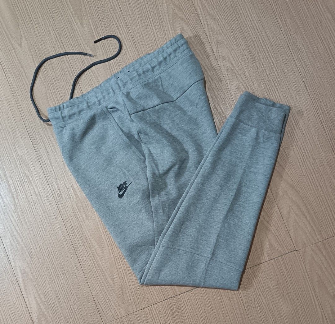 NIKE TECHFLEECE JOGGER PANTS - GRAY (Category: Joggers) located in Cavite. Submitted by marcuz.lifestyle (Listing ID 1468313586, Image 1). Description: WAIST:28-30 LENGTH:38 VERRYGOOD CONDITION NO ISSUE COLOR RATE:9.5/10 MOP:GCASH DELIVERY COURIER:JNT LOCATION:IMUS CAVITE.