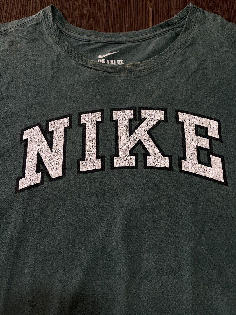 NIKE TEE VARSITY LOGO (dark green) (Category: Tshirts & Polo Shirts ) located in Manila. Submitted by sidequest2025 (Listing ID 1468391056, Image 2). Description: NIKE TEE VARSITY LOGO (dark green) issue: discolorization, crack print, need wash XXL print tag, L&W: 23X18, sleeve: 7, shoulder:16 100.