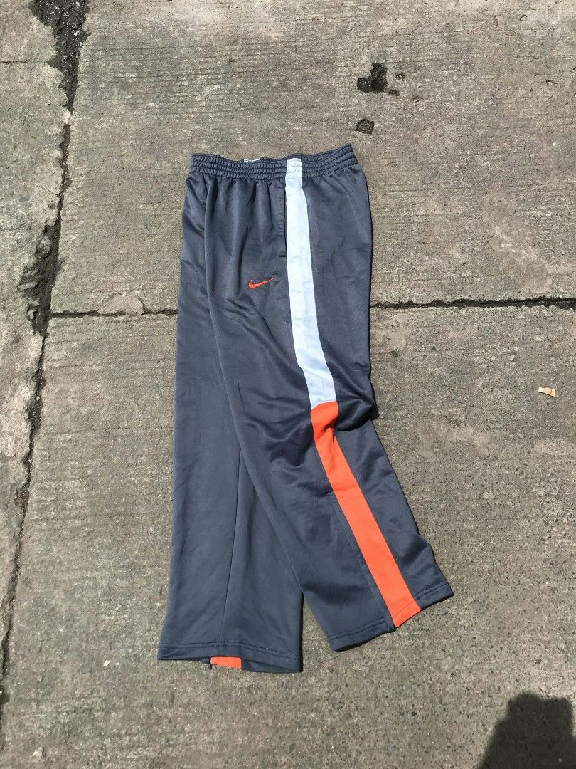 Nike track sweater pants (Category: Chinos) located in Manila. Submitted by thriftnicarl.3 (Listing ID 1468449575, Image 1). Description: waist - 30 to 34 length - 39.4 thigh - 14 leg open - 9.2 price - 449 Freeship via jnt.