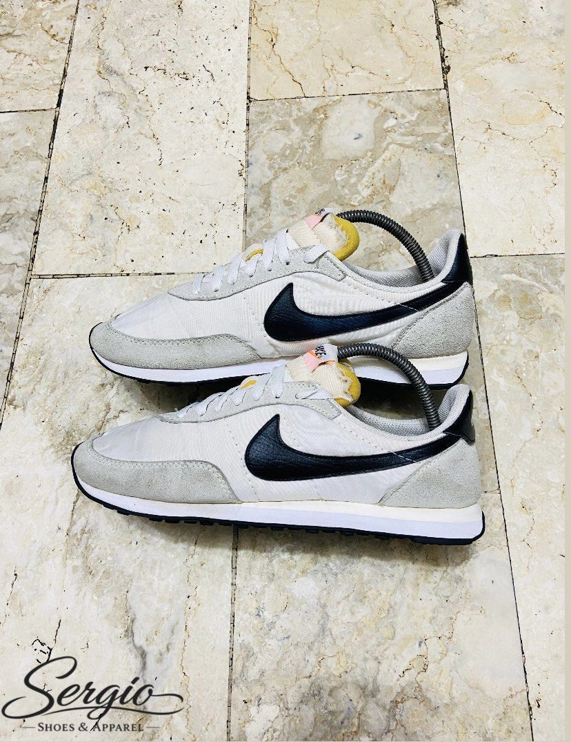 Nike Waffle Trainer 2 (Category: Sneakers) located in Manila. Submitted by supersergio (Listing ID 1468454617, Image 2). Description: - Brand: Nike - Model: waffle trainer - Colorway: White and Black - Materials: Nylon upper with suede overlays and leather swoosh - Features: Foam tongue with orange Nike logo tag, iconic black waffle outsole - Style: Classic 70s vintage runner, great for daily wear - Fit: True to size (standard width).