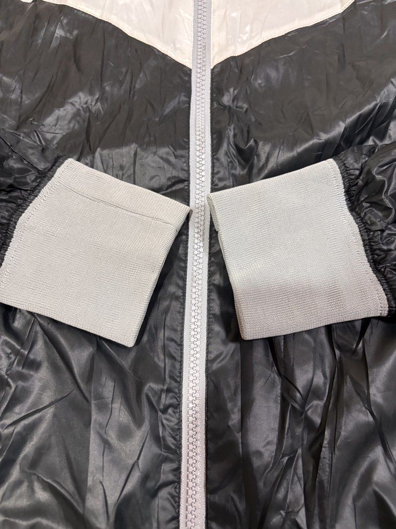 Nike Windrunner Jacket White Black XL (Category: Coats, Jackets and Outerwear) located in Mabalacat. Submitted by _limitlessfashion (Listing ID 1468302529, Image 3). Description: - Nike Windbreaker Jacket (The Windrunner) - 2 tone color - Guaranteed Authentic - Bnew condition with hangtag - Size Xl on tag - Length 27 - Width 23.5 - No major issue, need wash only - Good for running DM TO PURCHASE 📥.