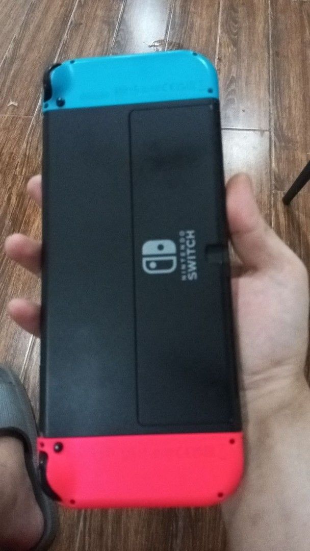 Nintendo Switch Neon Blue and Neon Red (Category: Nintendo) located in Makati City. Submitted by silvertiger_6ff597 (Listing ID 1468484548, Image 1). Description: - Nintendo Switch standard model with black body and kickstand - Iconic Neon Blue and Neon Red Joy-Cons included - Fully tested and working (powers on and displays home screen properly) - Buttons, joysticks, and screen are all in great, ready-to-play condition - Grab this unit while it'
