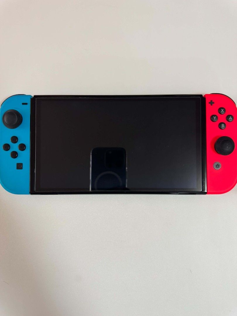 Nintendo Switch OLED - Good Condition (Category: Nintendo) located in Manila. Submitted by trueowl.24db90 (Listing ID 1468329769, Image 2). Description: Nintendo Switch OLED **SLIGHTLY NEGOTIABLE** Good condition - like new Complete accessories ✅️ 2 Joycons ✅️ 2 Joycon protective case ✅️ 1 joycon charging grip ✅️ 2 thumb grip ✅️ Installed screen protector ✅️ 2 extra screen protector ✅️ 1 dock (no cover) ✅ ️1 HDMI Cable ✅️ 1 Charger ✅️ 1 Nintendo 