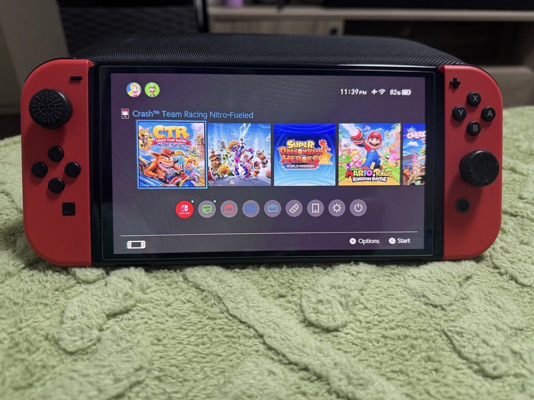 Nintendo Switch OLED Model Mario Red Edition (Category: Nintendo) located in Quezon City. Submitted by yansfern3 (Listing ID 1468386128, Image 3). Description: - All items in the photo are included w/ 128gb Sandisk Ultra Digital Games: - overcooked 2, PvZ and Mario rabbids kingdom battle Physical Games: - CTR, 2k24, Super Dragonball Heroes Nego for sure buyer. Pwede CDO via LBC/Lalamove Rsf: hindi na nagagamit. Naka stock nalang. No issue. .