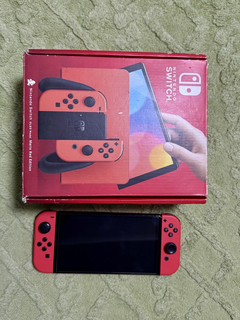 Nintendo Switch OLED Model Mario Red Edition (Category: Nintendo) located in Quezon City. Submitted by yansfern3 (Listing ID 1468386128, Image 2). Description: - All items in the photo are included w/ 128gb Sandisk Ultra Digital Games: - overcooked 2, PvZ and Mario rabbids kingdom battle Physical Games: - CTR, 2k24, Super Dragonball Heroes Nego for sure buyer. Pwede CDO via LBC/Lalamove Rsf: hindi na nagagamit. Naka stock nalang. No issue. .