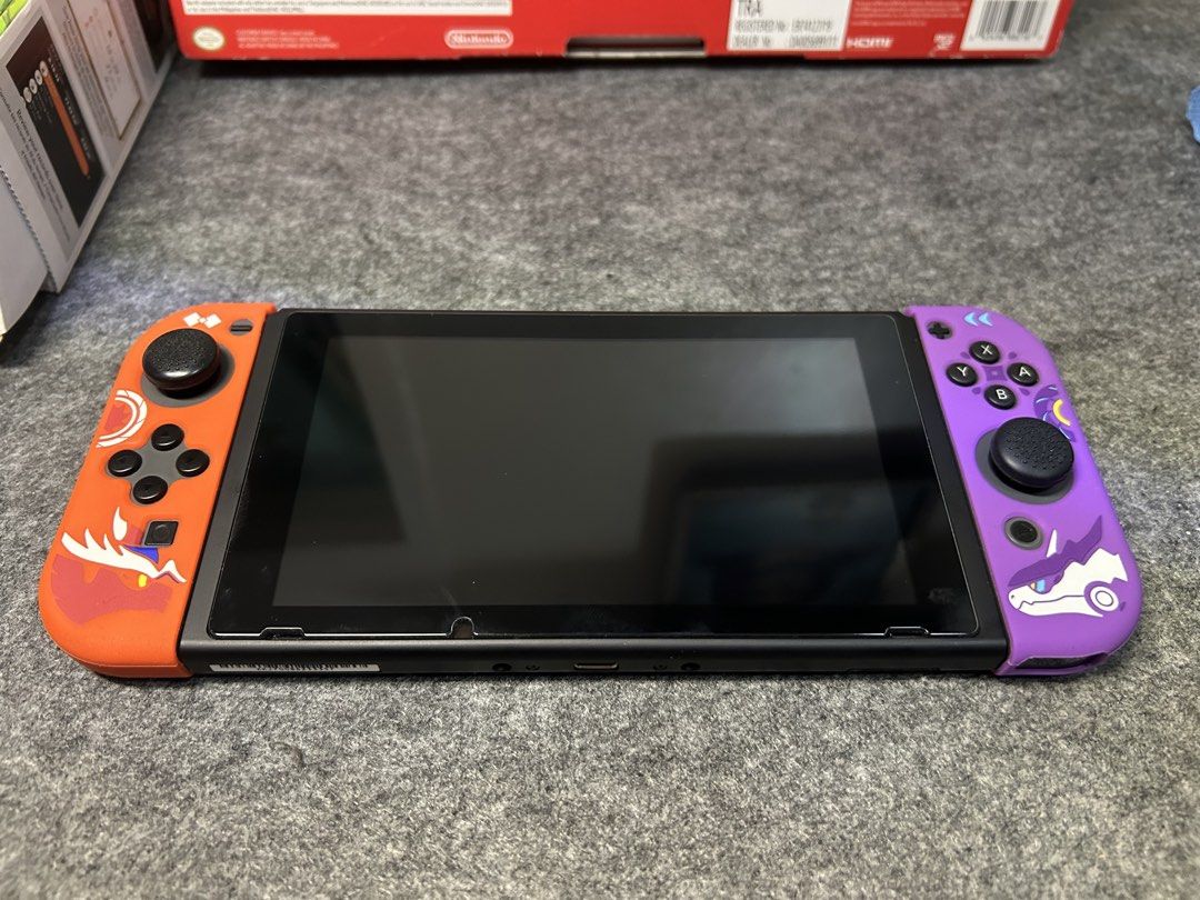 Nintendo Switch V2 + Complete accessories w/ box (Category: Nintendo) located in Manila. Submitted by aries_000 (Listing ID 1468355287, Image 2). Description: No Issues (unli checks on meet up) Complete accesories w/ box Hard travel case Dust cover Micro SD card Games(physical): Ringfit Pokemon Legends: Arceus Pokemon Scarlet.