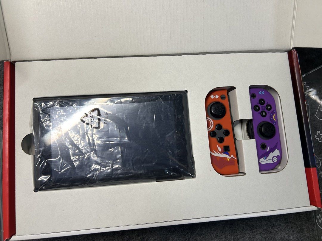Nintendo Switch V2 + Complete accessories w/ box (Category: Nintendo) located in Manila. Submitted by aries_000 (Listing ID 1468355287, Image 3). Description: No Issues (unli checks on meet up) Complete accesories w/ box Hard travel case Dust cover Micro SD card Games(physical): Ringfit Pokemon Legends: Arceus Pokemon Scarlet.