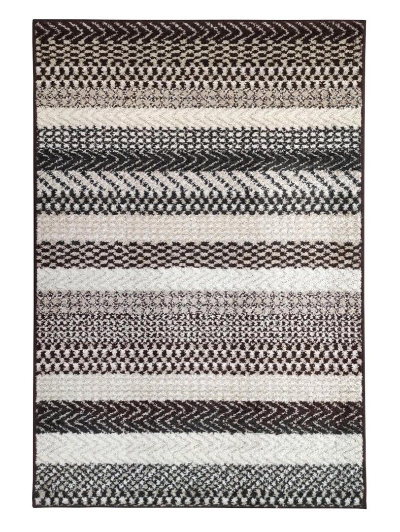NITORI JAPANESE CARPET (Category: Carpets, Mats & Flooring) located in Manila. Submitted by jcb_1219 (Listing ID 1468432485, Image 1). Description: - Design: Stylish chevron and geometric patterns - Colors: Warm brown, cream, and dark grey tones - Quality: Thick woven construction with neatly bound edges - Size: Standard rectangular, ideal for living rooms or bedrooms - Condition: Clean, textured finish, rolled up and ready for collection.