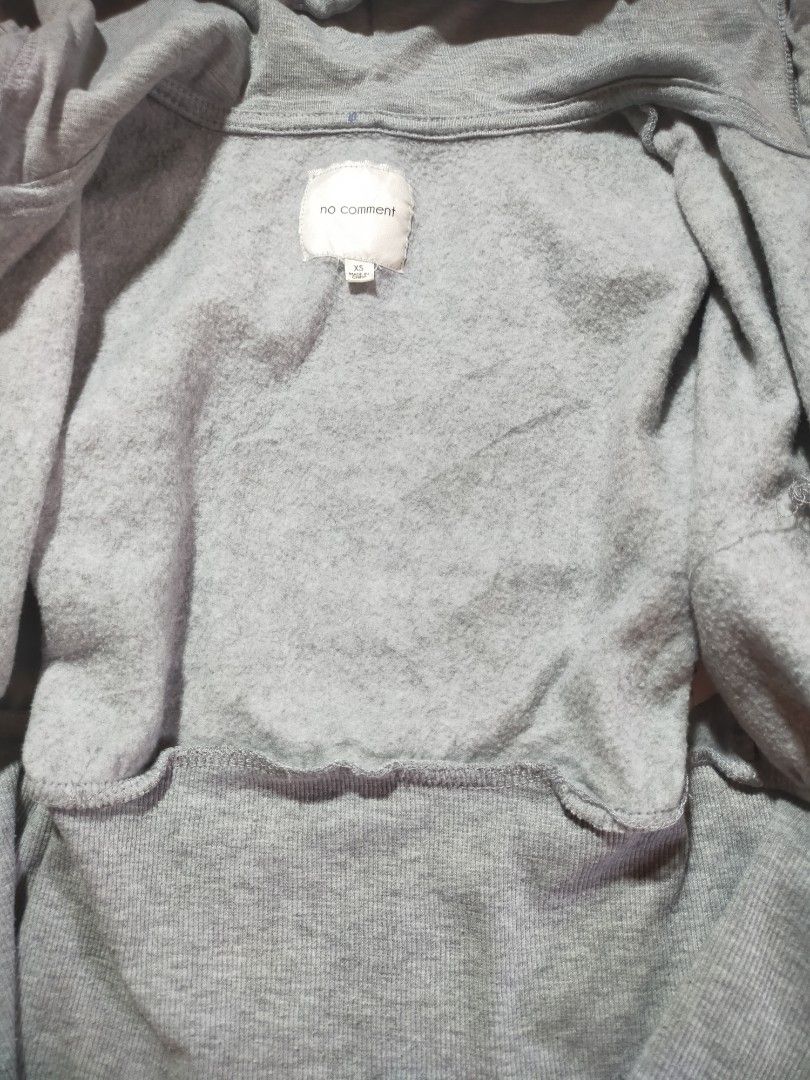 No Comment Gray Cropped Zip-Up Hoodie (Category: Coats, Jackets and Outerwear) located in Santo Tomas. Submitted by zenzenzennaya (Listing ID 1468295496, Image 2). Description: - Brand: No Comment - Size: XS - Color: Gray - Fit: Cropped with ribbed waistband and cuffs - Details: Full front zipper, attached hood, and drawstrings with metallic silver aglets (small issue on other aglet. see pics for more deets) not used/unused .